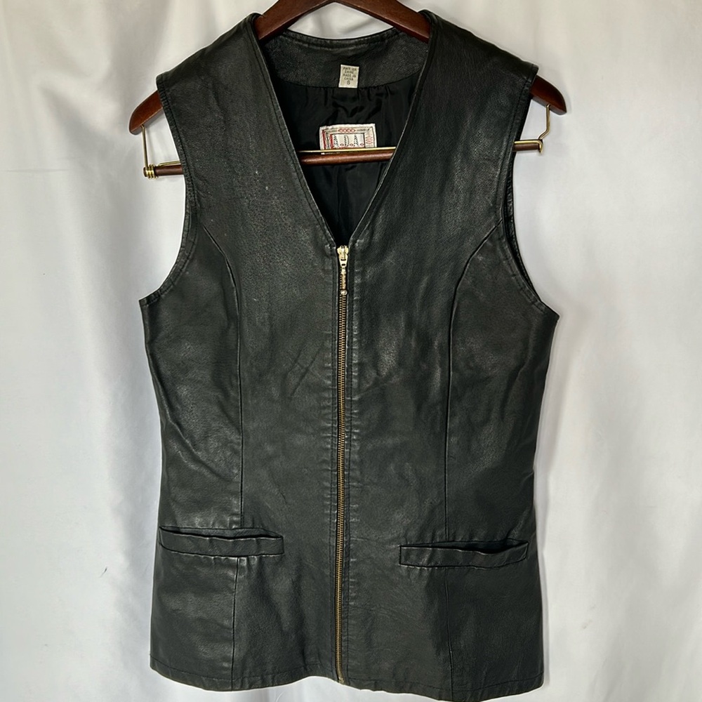 ADA black leather women’s vest. Size Small. Two pockets in front.